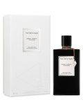 Van Cleef & Arpels perfume bottle and packaging on a white background