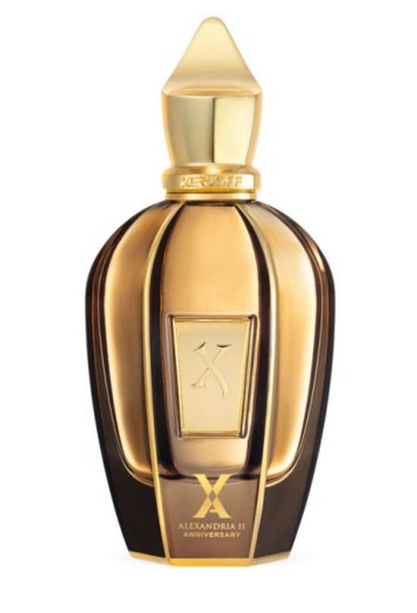 Gold and black perfume bottle with a pointed cap on a white background