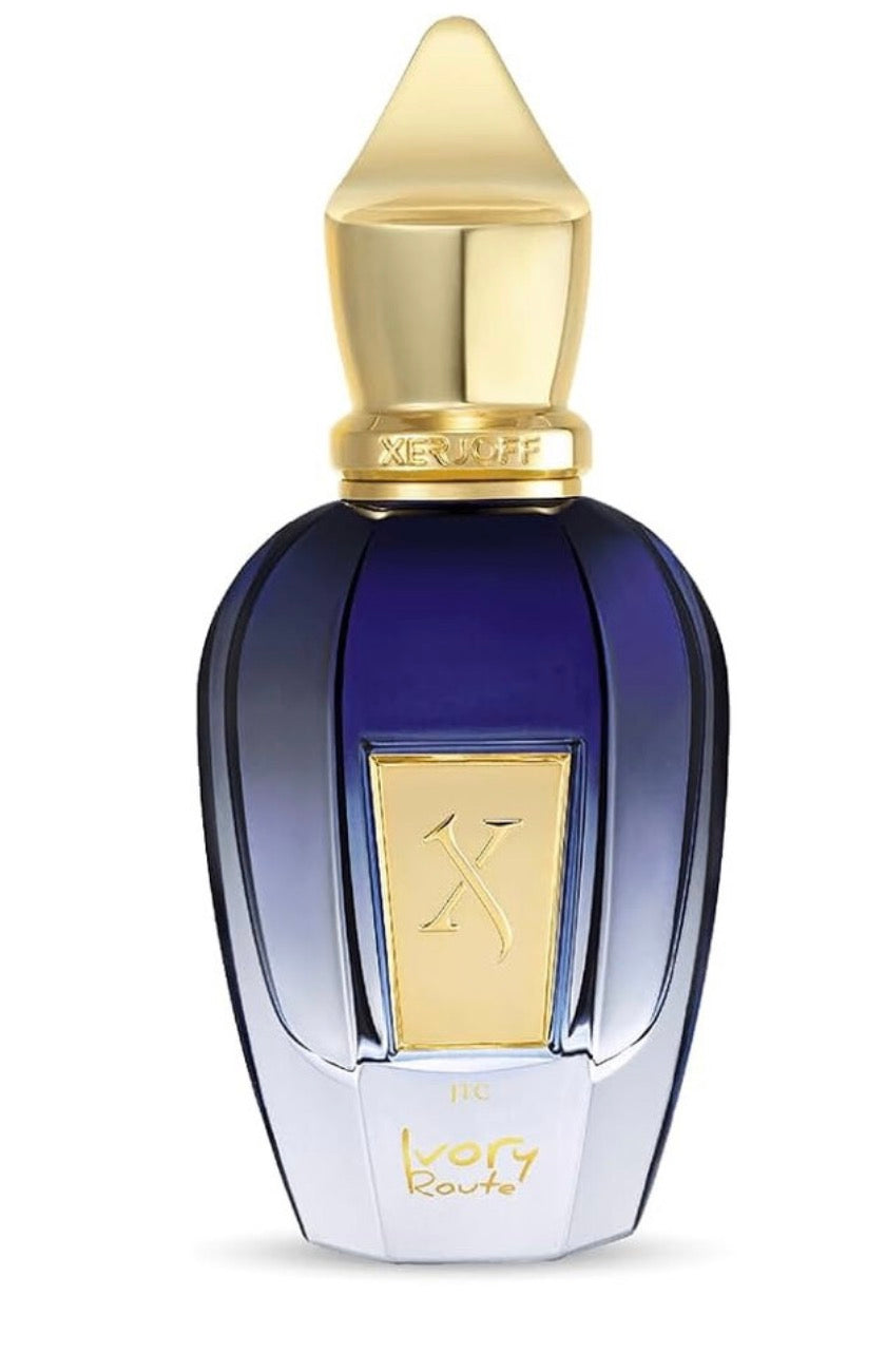 Perfume bottle with gold cap and label on a white background