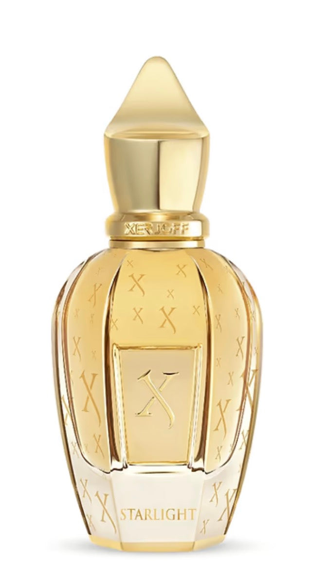 Perfume bottle with gold cap and detailed design on a white background