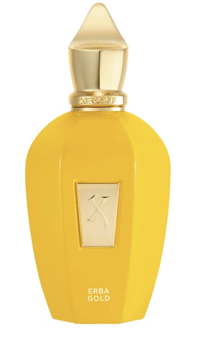 Yellow perfume bottle with gold cap on a white background