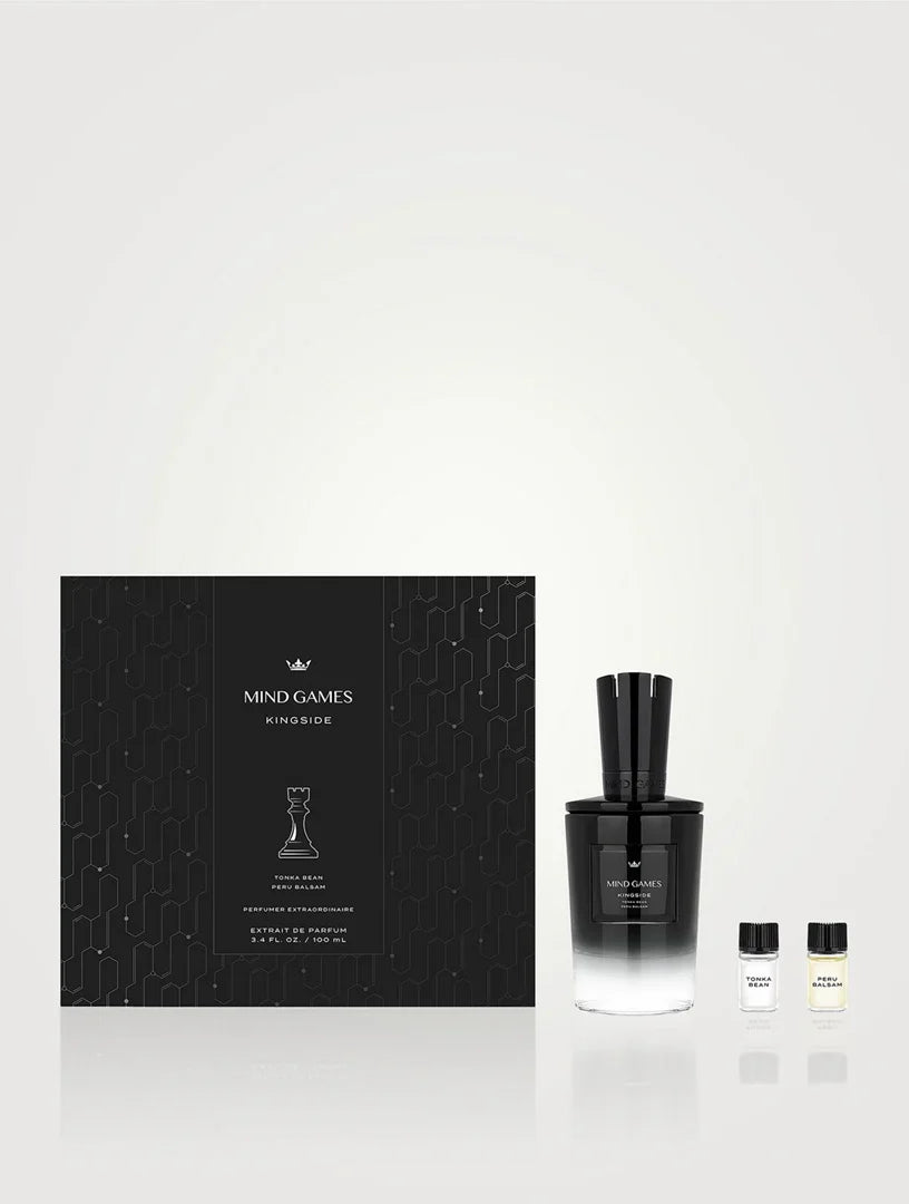 MIND GAMES perfume set with black packaging and gradient bottle on a white background