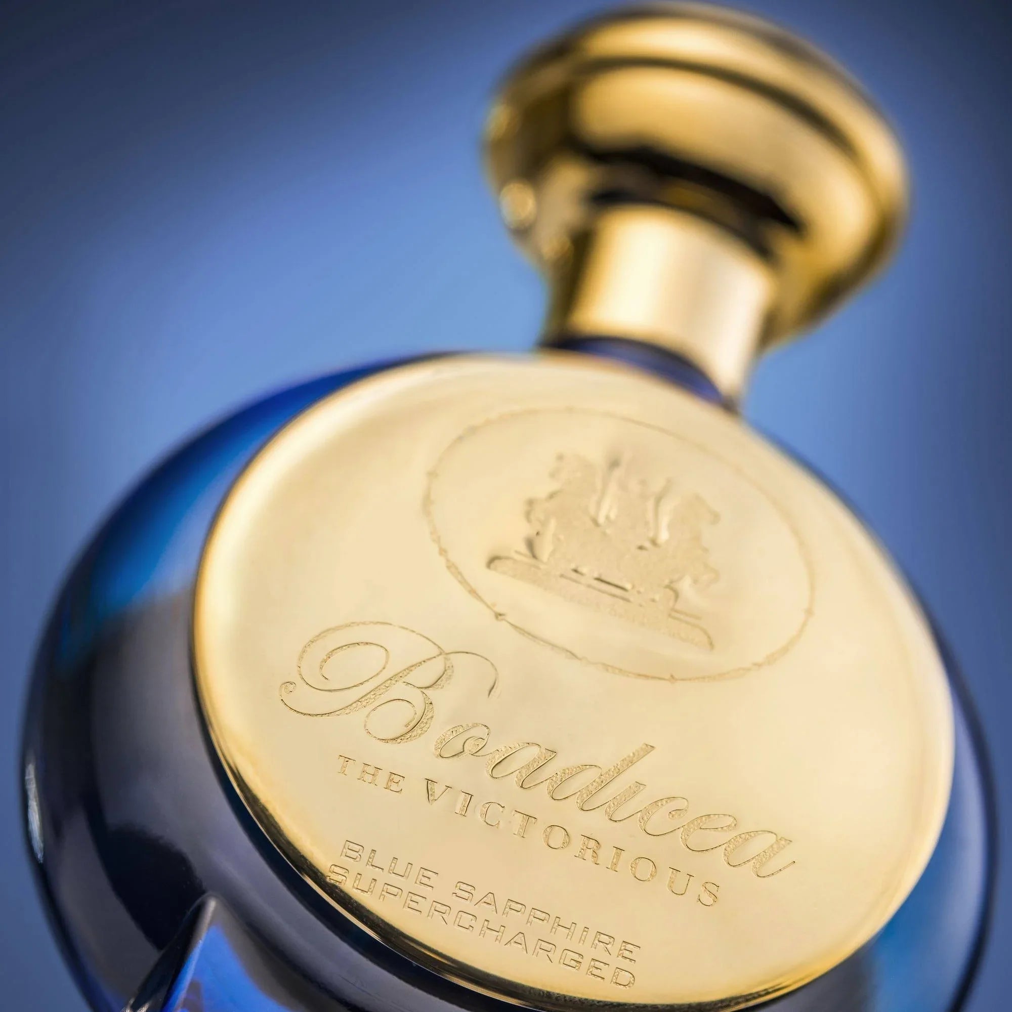 Blue and gold bottle of Boadicea The Victorious Blue Sapphire Supercharged on a blue background